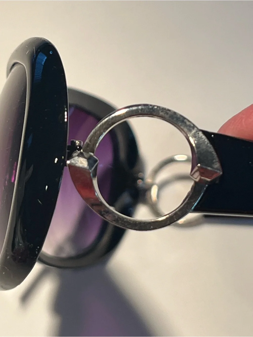 NWT fabulous oversized black sunglasses with violet lenses.